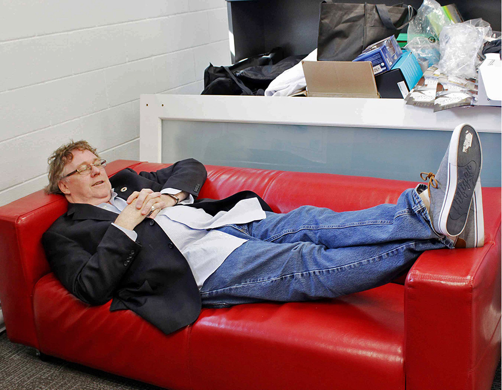 picture of Kevin Holmes, the project director of slide on the couch